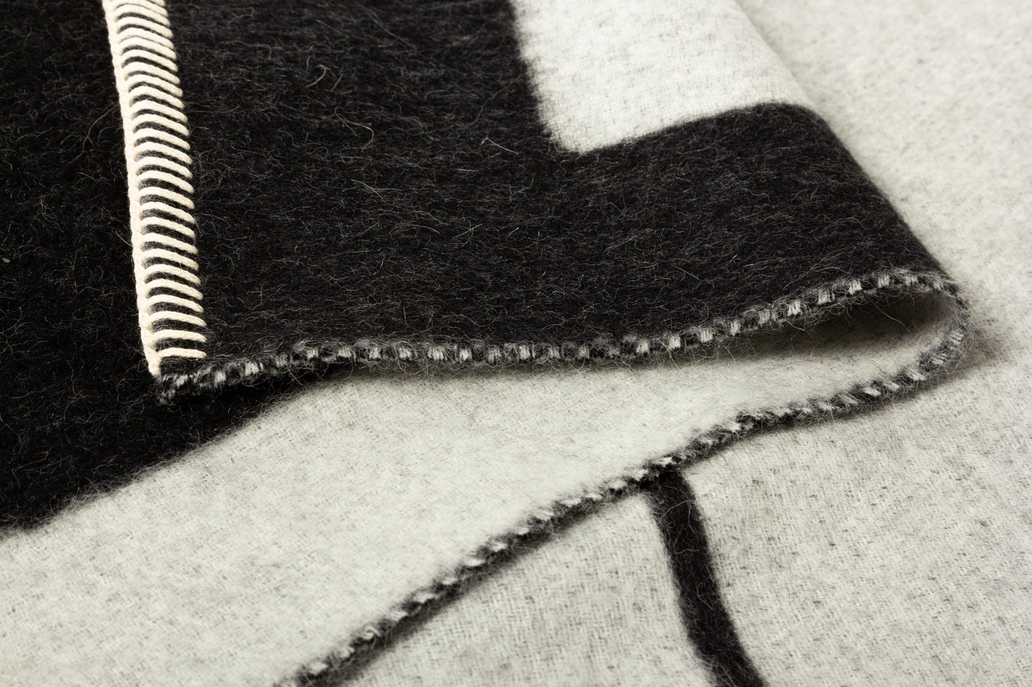Black Ivory Reversible Throw