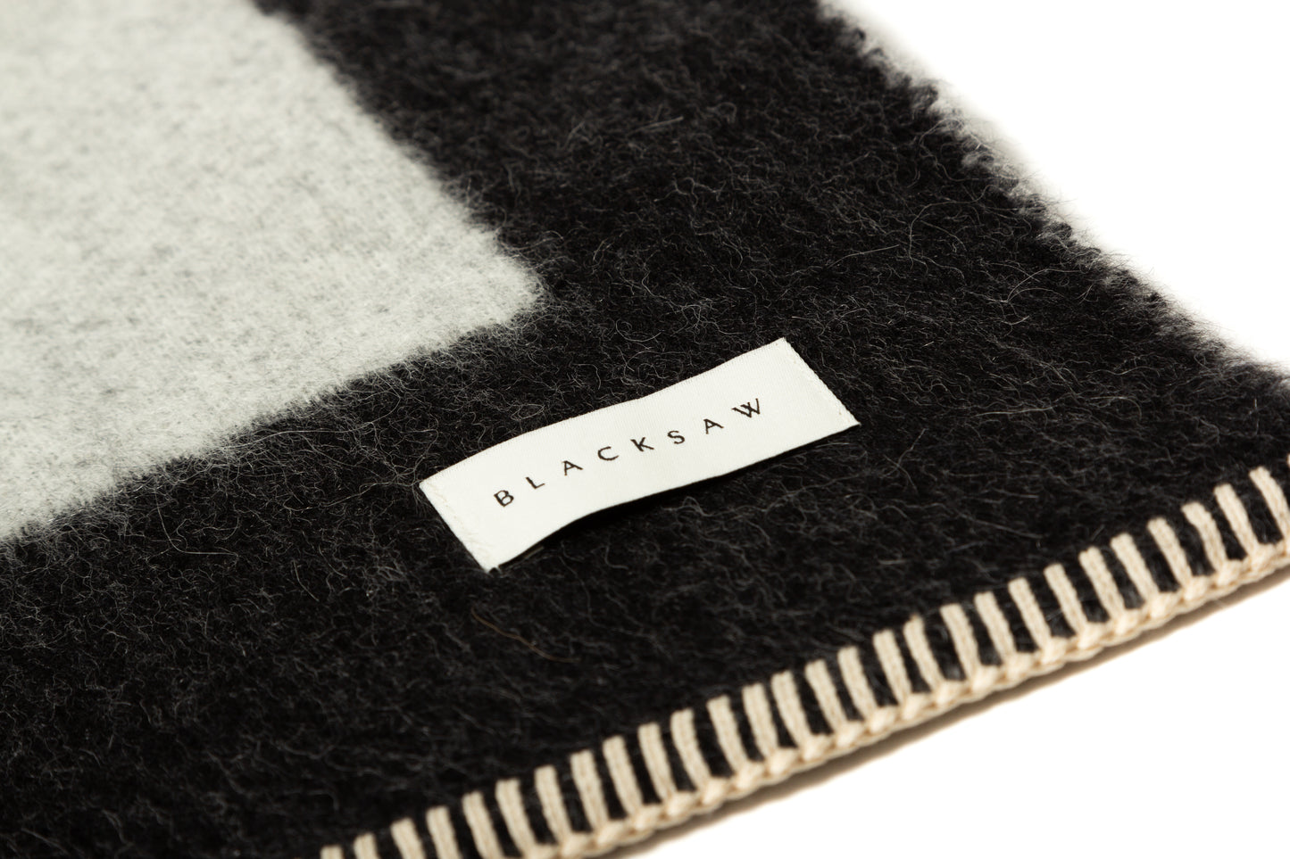 Black Ivory Reversible Throw